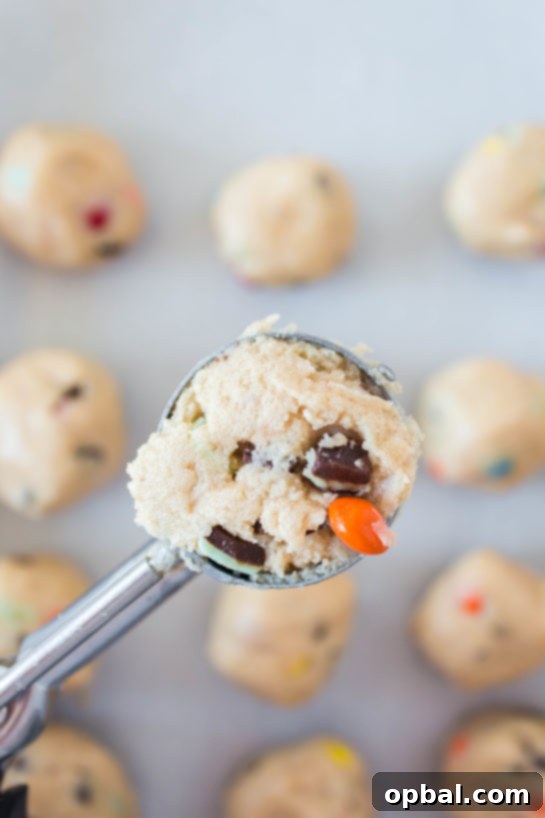 Decadent Dough Bites 11 Scooping out perfect portions of edible cookie dough to form individual bombs