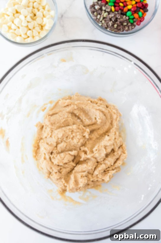 Decadent Dough Bites 6 Mixing wet ingredients in a bowl for the Edible Cookie Dough Bombs recipe