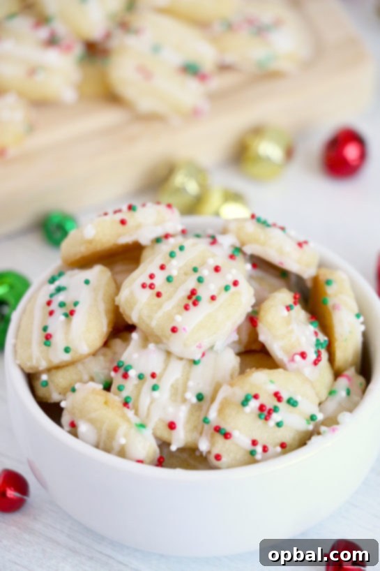 Merry Little Sugar Cookies 15 Easy and fast Christmas Sugar Cookie Bites recipe for Christmas cookie trays or edible gift idea for the holidays!