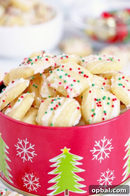 Merry Little Sugar Cookies 3 The finished frosted Christmas Sugar Cookie Bites recipe for Christmas cookie trays!