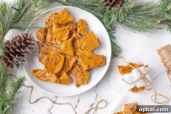 Quick Microwave Peanut Brittle 18 Overhead shot of the wrapped and plated Microwave Peanut Brittle recipe