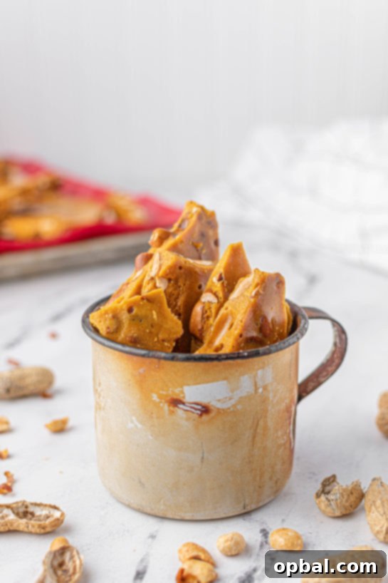 Quick Microwave Peanut Brittle 19 Photo of the completed Microwave Peanut Brittle recipe shown in a mug