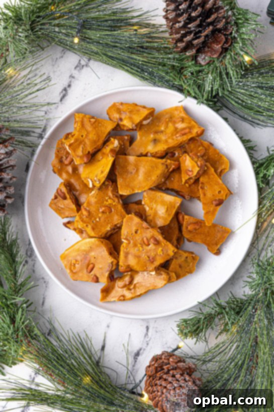 Quick Microwave Peanut Brittle 3 Perfect golden brown Microwave Peanut Brittle recipe is the perfect sweet & salty treat for the holidays with the perfect crunch and sheen! A great edible gift for Christmas!