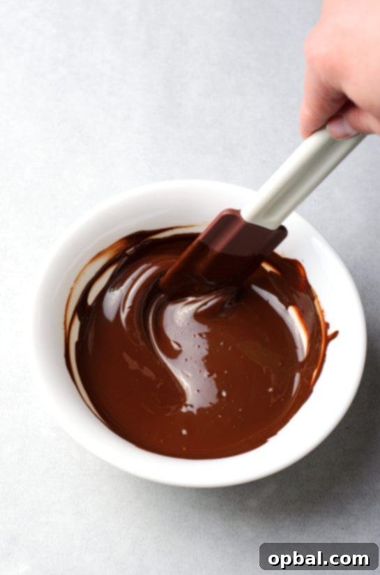 Melting the chocolate for the chocolate hazelnut crinkle cookies recipe