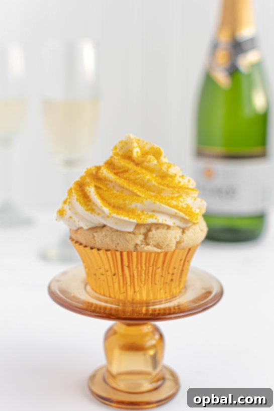 New Years Eve Bubbly Cupcakes 3 New Year's Eve Champagne Cupcakes recipe is perfect for birthdays, Mother's Day brunch or a New Year’s Eve dessert! They are jazzed up with gold sprinkles to add some glam!