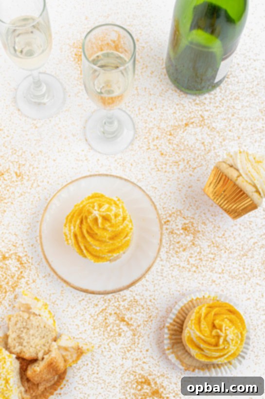 New Years Eve Bubbly Cupcakes 5 Overhead shot of the finished Champagne Cupcakes recipe with the gold sprinkles