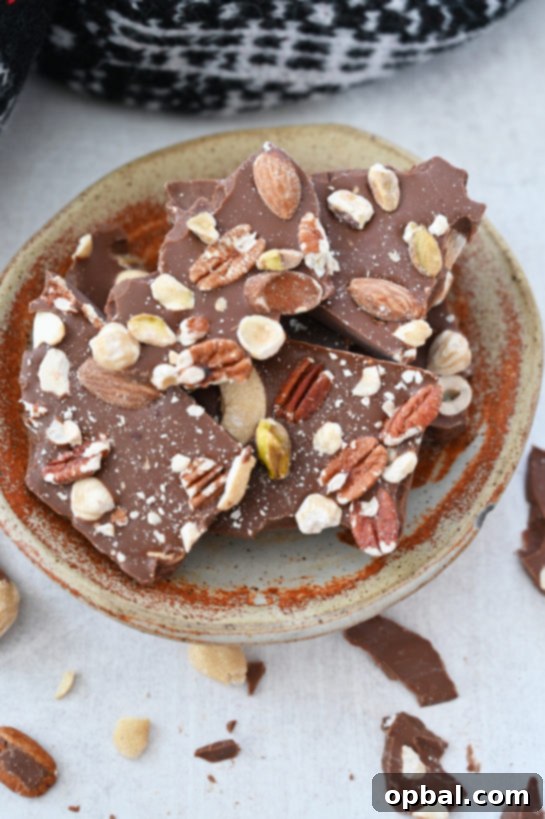 Simple 5-ingredient Salted Chocolate Almond Hazelnut Bark, a beautiful, festive special occasion or holiday dessert and edible gift.