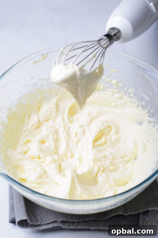 Velvet Chocolate Romance Cupcakes 4 Making the creamy vanilla cream cheese frosting for Lover's Chocolate Cupcakes