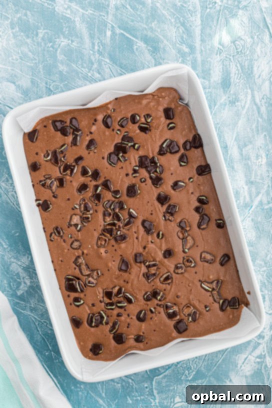 Decadent Andes Mint Fudge 12 An overhead view of the Andes Mint Fudge in the pan, showing its glossy finish and even spread.
