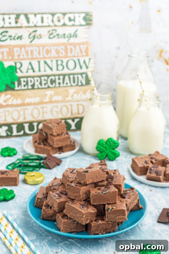 Decadent Andes Mint Fudge 10 A generous slab of Andes Mint Fudge in a parchment-lined baking pan, freshly set and ready to be cut.