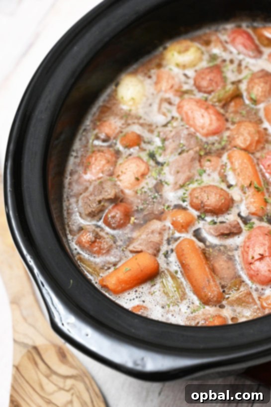 Effortless Slow Cooker Beef Stew 4 Perfect, easy Crock Pot Beef Stew recipe with tender beef, root vegetables, and a rich, aromatic sauce, ideal for any time of the year.