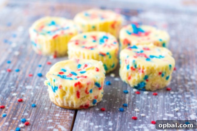 Star-Spangled Mini Cheesecakes 14 Simple Mini Red, White, and Blue Cheesecakes recipe layered with a Golden Oreo crust and creamy tangy cheesecake. Top with sprinkles and whipped cream for the perfect patriotic dessert for 4th of July!