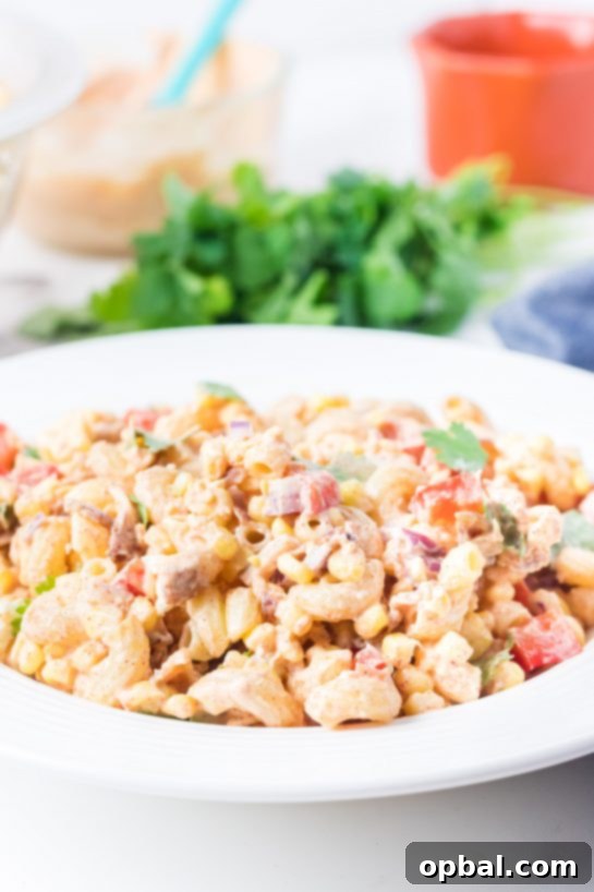 Elote Pasta Salad 9 Mexican Street Corn Pasta Salad is light and healthy, yet so delicious. It’s the perfect side or main dish for a big gathering or just a quick dinner during the week with a Mexican twist!