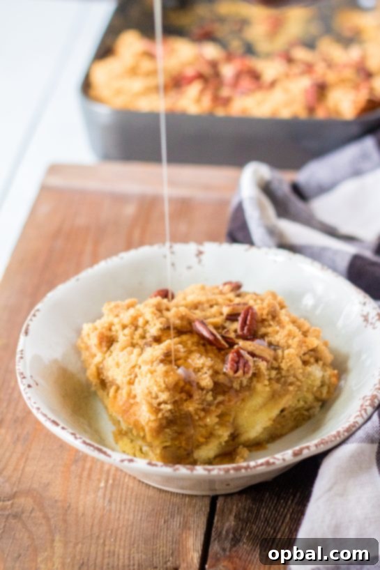 Spiced Sweet Potato French Toast Bake 3 An inviting overhead view of the baked Sweet Potato French Toast Casserole, showcasing its rich texture and warm colors, ready to be served for a special occasion.
