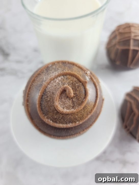 A very close-up photo emphasizing the rich texture and delightful appearance of a Mocha Hot Chocolate Bomb.