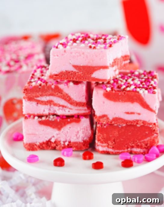 Sweetheart Swirl Strawberry Fudge 2 Layered Valentine's Day Strawberry Fudge recipe requires just four ingredients and can be made in under 10 minutes! Pretty and super cute gift for your Valentine.