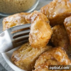 Crockpot Pull-Apart Perfection 13 Crock Pot Monkey Bread turns your classic monkey bread recipe into a delicious slow cooker creation. Full of delicious biscuits, coated in cinnamon and sugar, then drizzled with a rich icing. Perfect for breakfast or dessert.