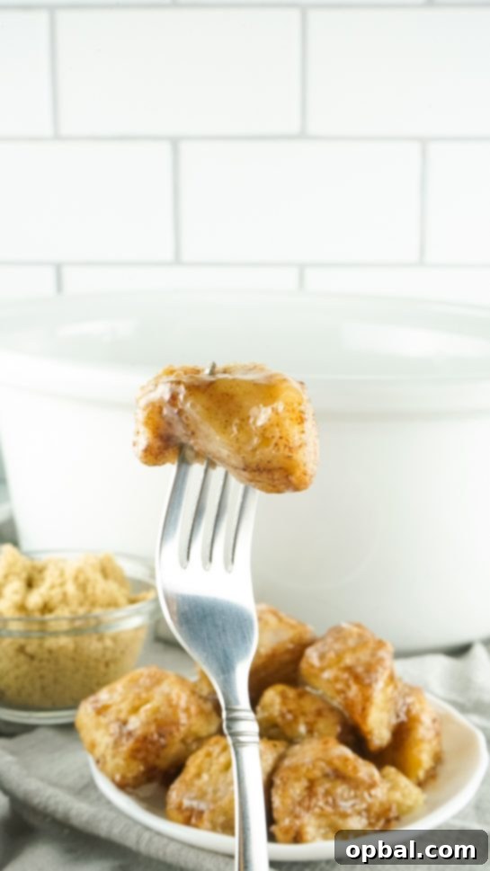 Crockpot Pull-Apart Perfection 5 Crock Pot Monkey Bread turns your classic monkey bread recipe into a delicious slow cooker meal for holidays. Full of delicious biscuits, coated in cinnamon and sugar, then drizzled with a rich icing. Perfect for brunch, breakfast or dessert.