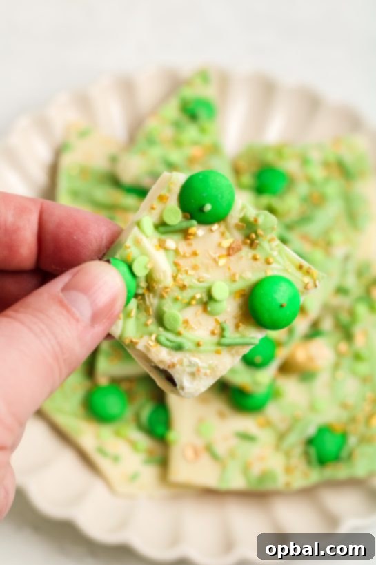 Golden Clover Crunch 10 Easy Leprechaun Bark candy recipe is loaded with colorful and green, festive toppings. It’s a different flavor and texture in every bite, tastes great, and is perfect for St. Patrick's Day!