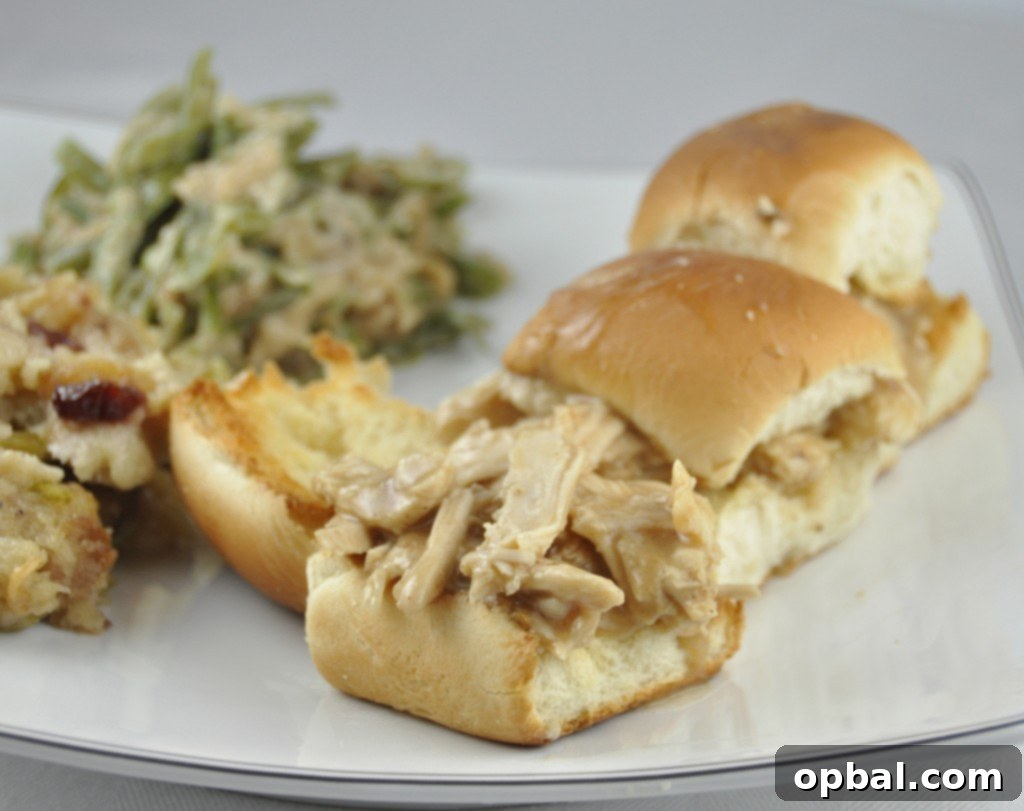 Leftover Turkey Sliders Leftover Turkey Sliders made from leftover Thanksgiving turkey and gravy on a wooden board