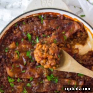 Hearty Beef & Bean Bake 11 Beefy Baked Beans are my favorite!! Beans get mixed with ground beef, onion and bell pepper, brown sugar, ketchup, mustard and Worcestershire before getting topped with a peppered brown sugar bacon.