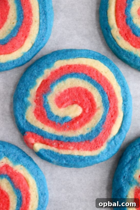 Patriotic Swirl Cookies 8 Easy Patriotic Pinwheel Cookies are a classic, slice and bake soft sugar cookie recipe all jazzed up for the 4th of July! These patriotic pinwheel cookies have beautiful swirls of red, white and blue.