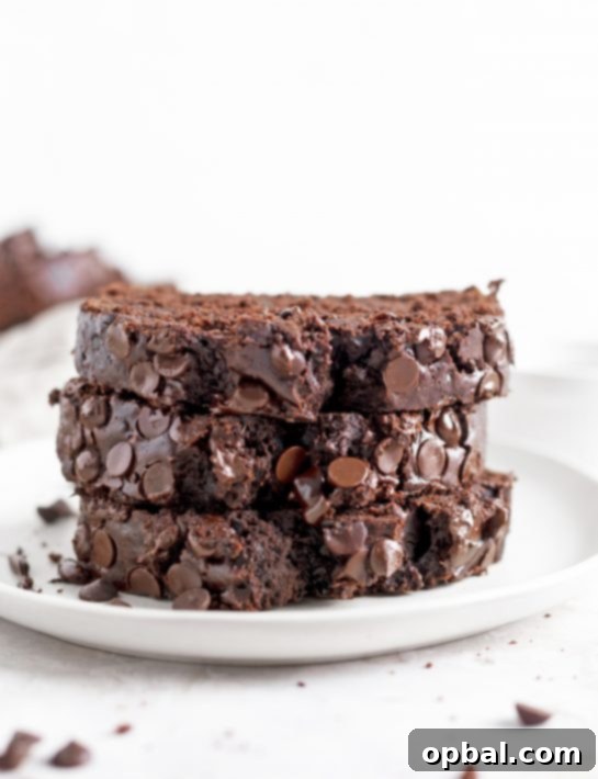 Moist and fudgy Chocolate Zucchini Bread recipe is filled with shredded zucchini and no one will be any the wiser since it tastes just like chocolate cake. It’s super delicious and secretly healthy.