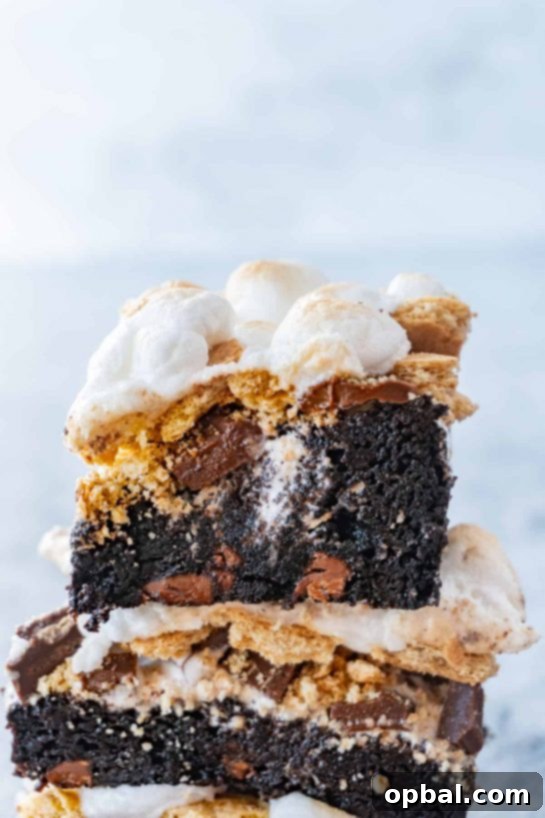 Ultimate S'mores Indulgences 7 Easy S’more Brownies Recipe, the perfect combination of chocolatey brownies, gooey marshmallow, delicious graham cracker, and tasty chocolate.