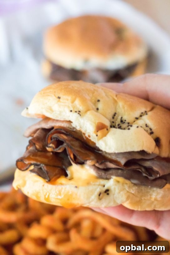 Homemade Arby's Beef and Cheddar 2 These Copycat Arbys Beef & Cheddars are the ultimate copycat recipe! They taste just like the real thing except you get to skip the drive thru and it’s faster! Onion buns, roast beef, cheddar sauce and the secret red sauce (French dressing) make these sandwiches come together in minutes!