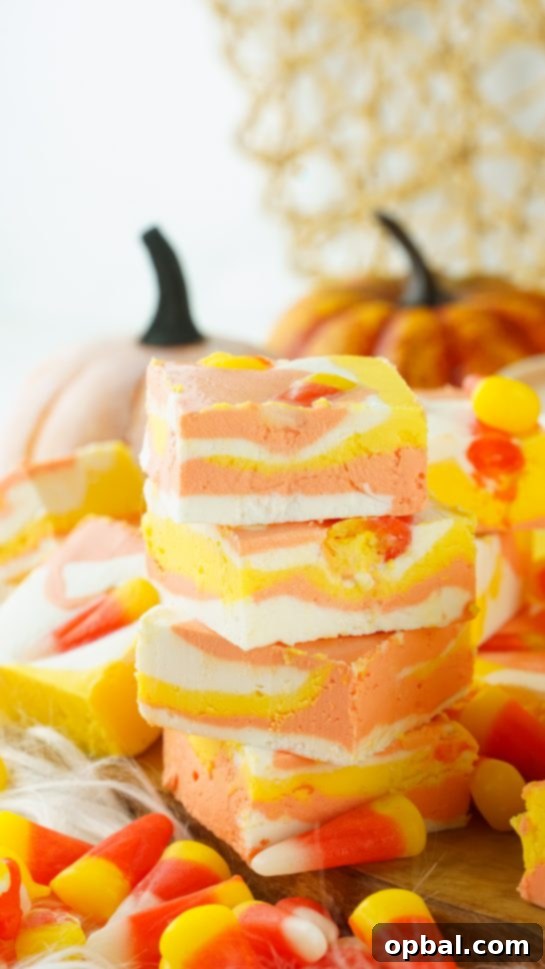 Tri-Color Candy Corn Fudge 2 Deliciously creamy No-Bake Candy Corn Fudge, an easy Halloween treat perfect for kids and adults. Made with just 4 ingredients in 15 minutes.