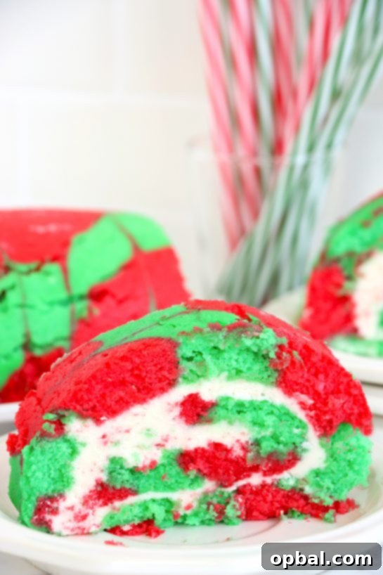 Festive Yule Log Cake 11 The finished Christmas Cake Roll, showcasing a beautiful swirl and festive colors, ready to be enjoyed as a delightful holiday dessert.