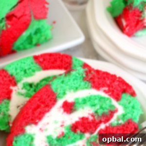 Festive Yule Log Cake 12 Christmas Cake Roll is the perfect Holiday Dessert recipe or Treat for your friends and family! This cake is easy to make for the holidays and a fun twist on traditional cake, with the colors and look of Christmas!