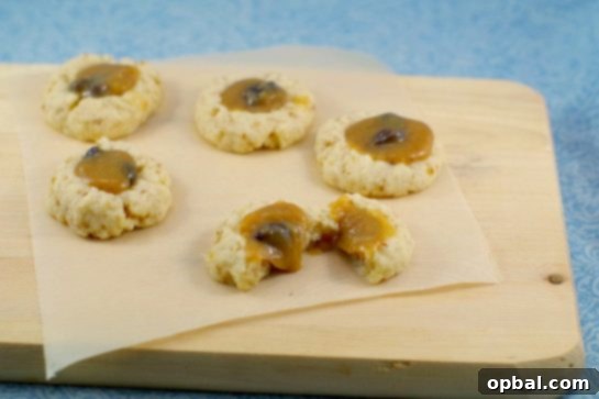 Signature Thumbprint Treats 7 Decadent Butter Tart Thumbprints, recreating the classic Canadian dessert in a delicious cookie form.