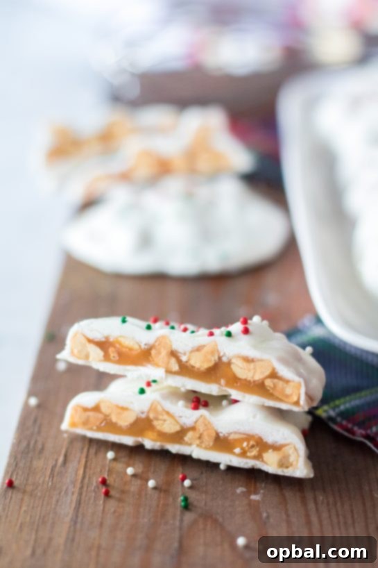 Icebound Talons 8 Easy, No-Bake Polar Bear Claws: a festive Christmas treat with caramel, peanuts, and white chocolate coating, ready for sprinkles.