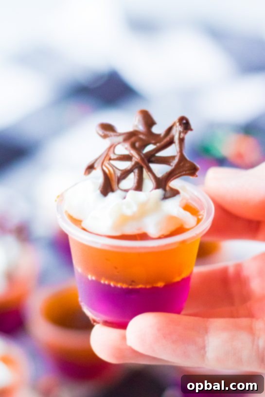 Halloween Spirit Shots 8 A close-up view of the perfectly set and colorful Halloween Jello Shots, ready for your party.