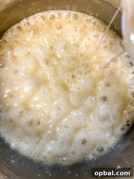 Sparkling New Year Popcorn Bites 3 Boiling the ingredients for the delicious New Year Champagne Popcorn Balls recipe to create a sticky, sweet coating for popcorn.