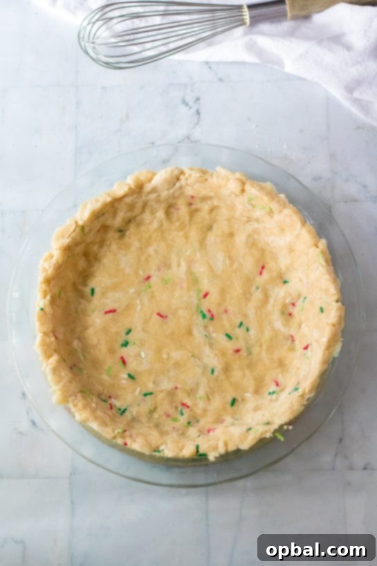 Velvet Sugar Pie 4 Steps involved in preparing the effortless no-roll crust for the Christmas Sugar Cream Pie recipe.