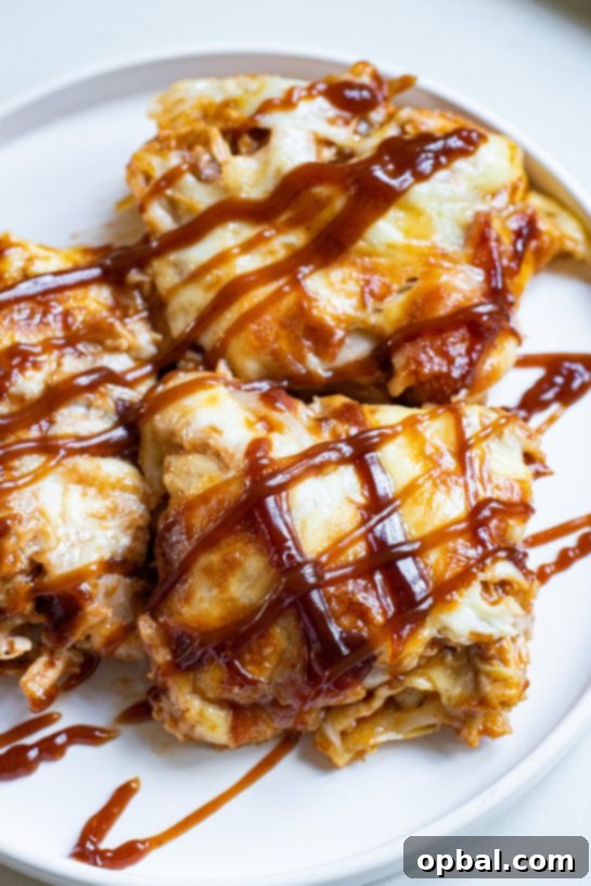 This Sheet Pan BBQ Chicken Pizza recipe is easy to make, with a crispy crust, cheese, and tender chicken.