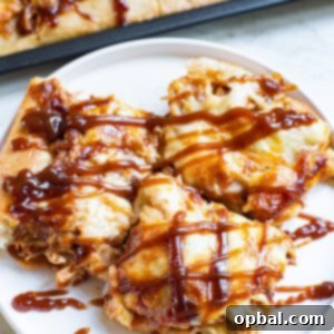 Sheet Pan BBQ Chicken Pizza has a crispy crust, tons of cheese, and tender chicken, with the sweetness of hickory barbecue sauce. It’s a snap to make!