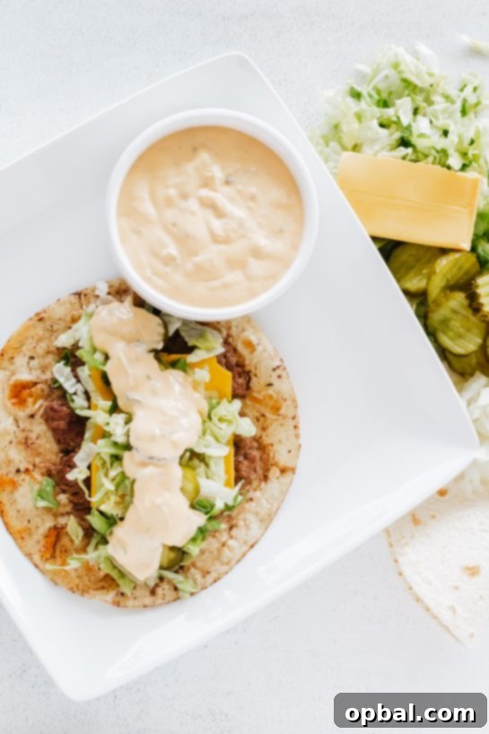 Viral Big Mac Tacos 7 An inviting overhead view of freshly made Big Mac Tacos, showcasing the rich toppings and special sauce, ready for a delicious low-carb meal.