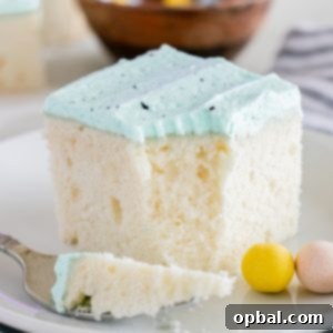 The finished Easter Speckled Egg Snack Cake, beautifully adorned with blue frosting and chocolate speckles.