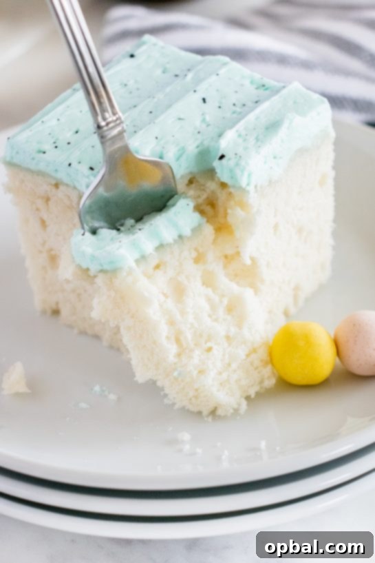 Robin's Egg Easter Cakelets 10 A close-up artistic shot of the speckled blue frosting, emphasizing the delicate chocolate splatters.