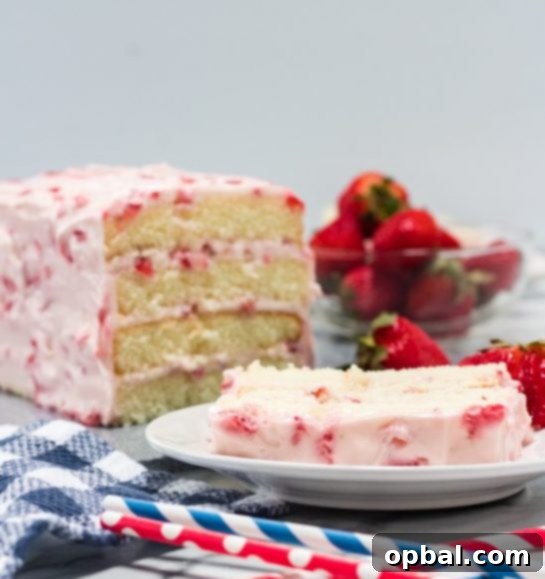 Strawberry Cloud Layer Cake 2 Delicious Strawberries & Cream Layered Cake with fresh berries, a perfect light and fluffy spring dessert for Easter.