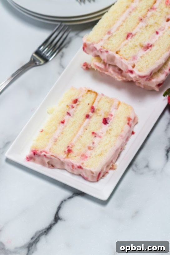 Strawberry Cloud Layer Cake 9 Another view of the elegant sliced Strawberries & Cream Layered Cake, perfectly portioned for an Easter dessert.