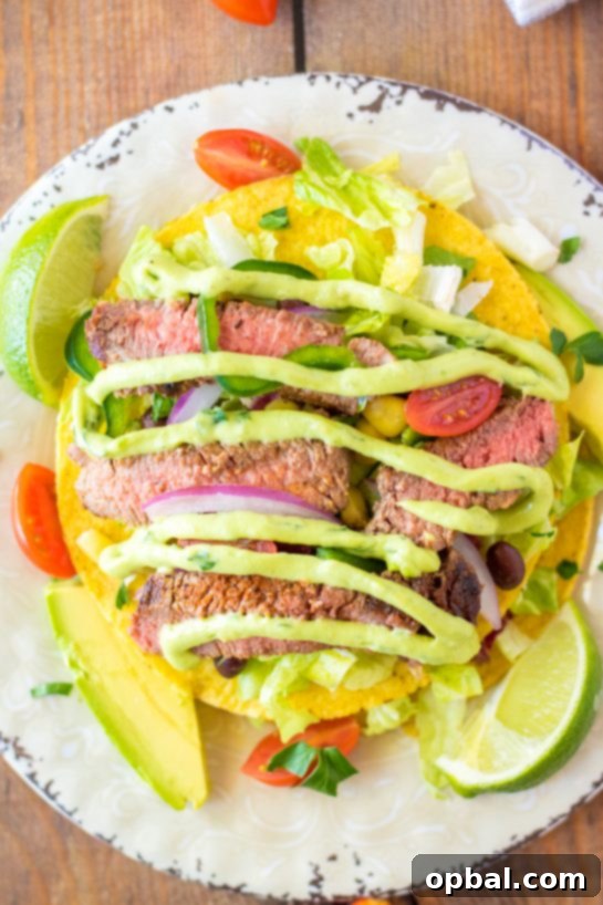 Southwestern Steak Tostada Salad 2 Juicy Steak Tostada Salad with fresh veggies and creamy cilantro-lime vinaigrette