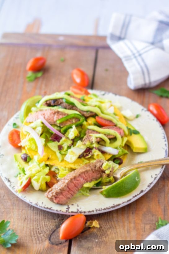 Southwestern Steak Tostada Salad 5 Overhead shot of a vibrant Steak Tostada Salad ready to be served