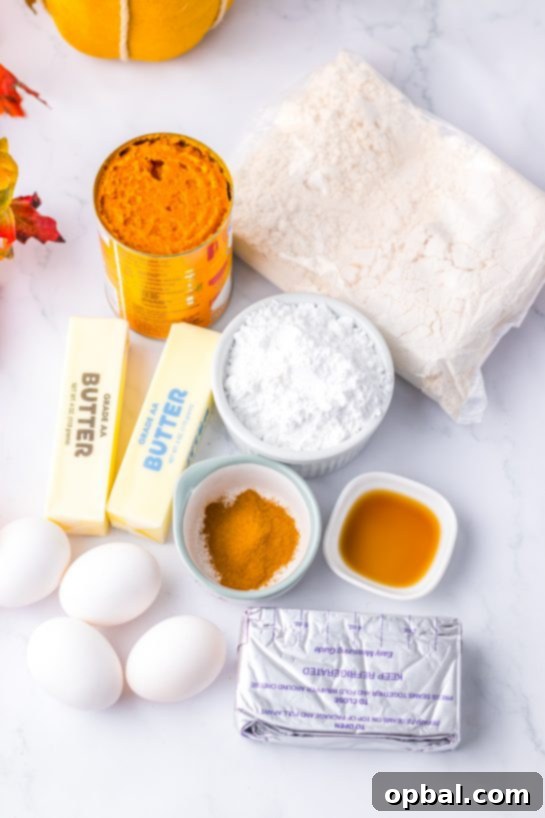 Decadent Pumpkin Gooey Bliss 3 Essential ingredients for crafting the perfect Pumpkin Gooey Butter Cake, including a yellow cake mix, pumpkin puree, cream cheese, butter, eggs, vanilla extract, powdered sugar, and cinnamon.