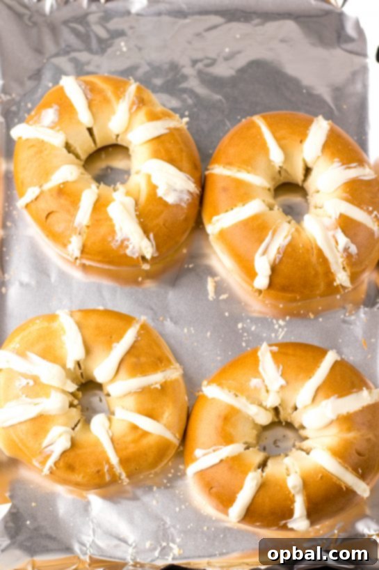 Photo of Tik Tok Stuffed Bagels, now generously filled with the sweetened cream cheese mixture in each slice.