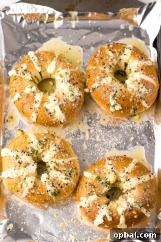 Photo of freshly baked Tik Tok Stuffed Bagels, golden brown and irresistible, right out of the oven.