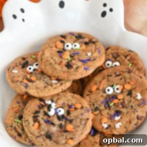 Ghoulishly Good Chocolate Chip Monster Cookies 7 Halloween Monster Chocolate Chip Cookies recipe: the perfect blend of crisp edges and chewy centers, bursting with rich buttery flavor and gooey chocolate chips. Topped with playful candy eyes and a sprinkle of festive colors, they’re not just a treat—they’re a fun and spooky addition to any Halloween celebration.